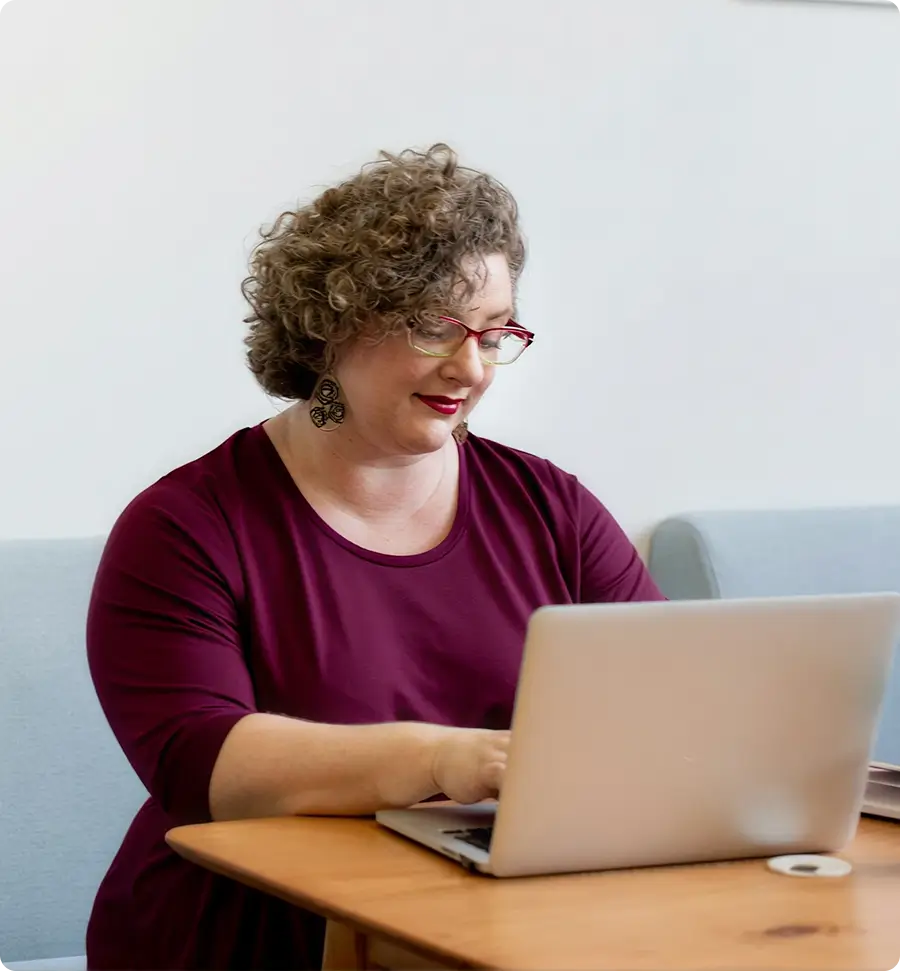 faculty member looking at her laptop (2)